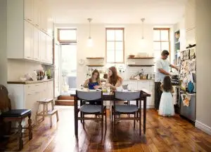 family-in-kitchen-at-home- In Cheshire